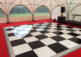 black and white chequered dancefloor wedding private marquee