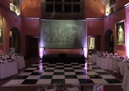 cowdray house black and white dancefloor and purple uplighters in bucks hall