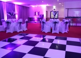portsmouth marriott hotel heritage suite chair cover and sash with feather vase black and white