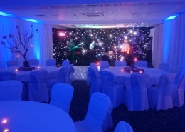 room drapes draping with blue uplighters and black starcloth at solent hotel and spa
